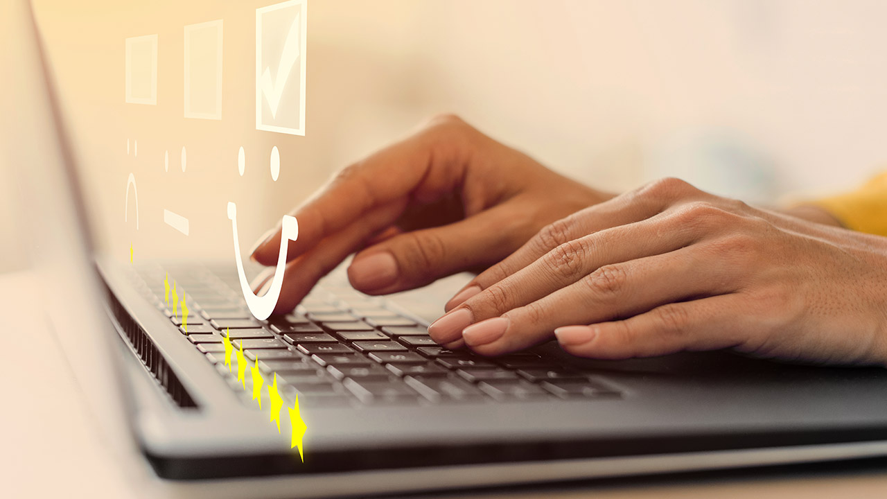 Software quality assurance professional reviewing application feedback and ratings on a laptop.